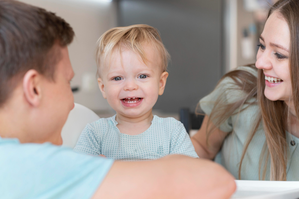 Close up happy parents with smiley toddler